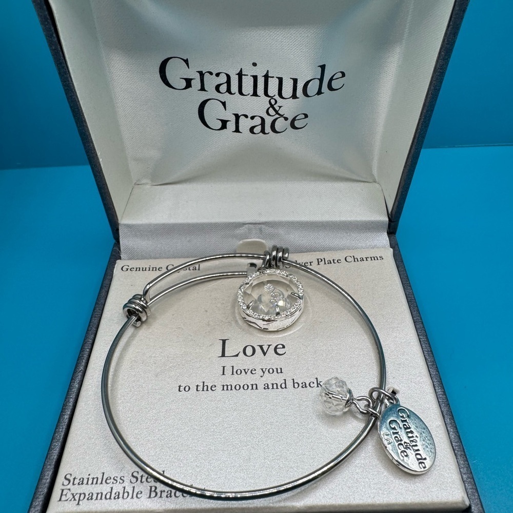 NIB Silver Charm Bracelet. Genuine Crystal.